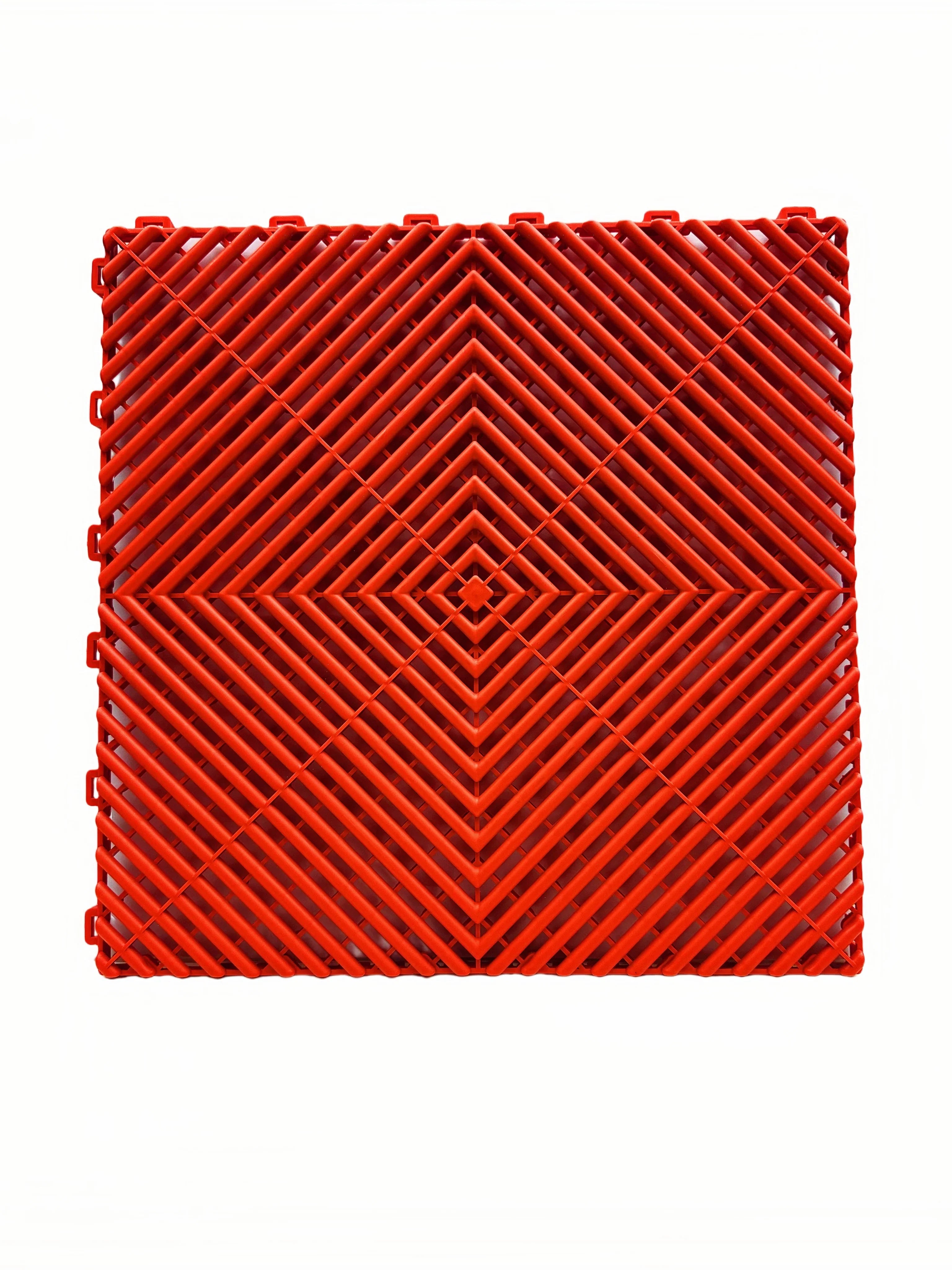 Red interlocking plastic floor grate for car washes, garages, or playgrounds with diamond pattern