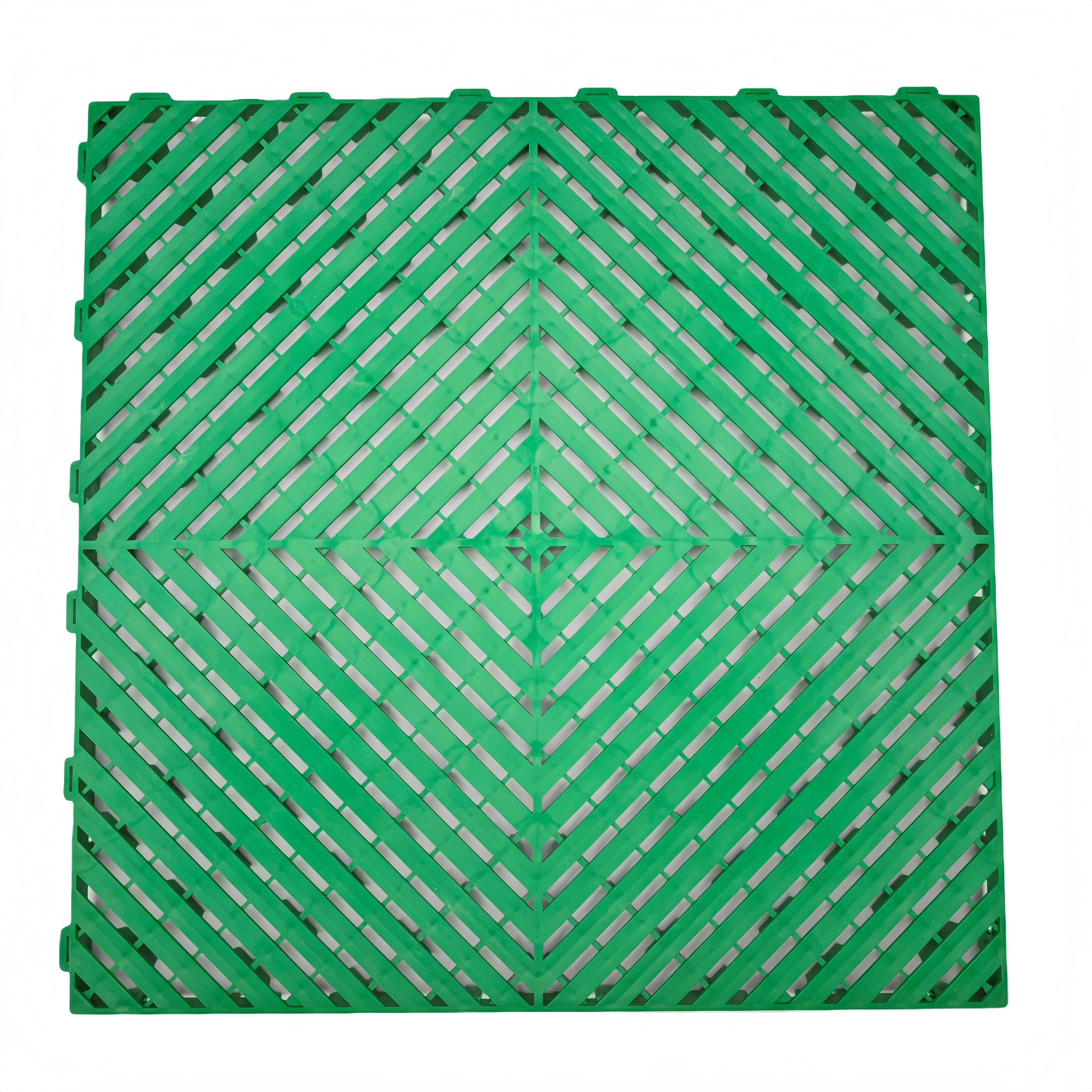 Green plastic interlocking floor grate for car washes, garages, pools, and playgrounds
