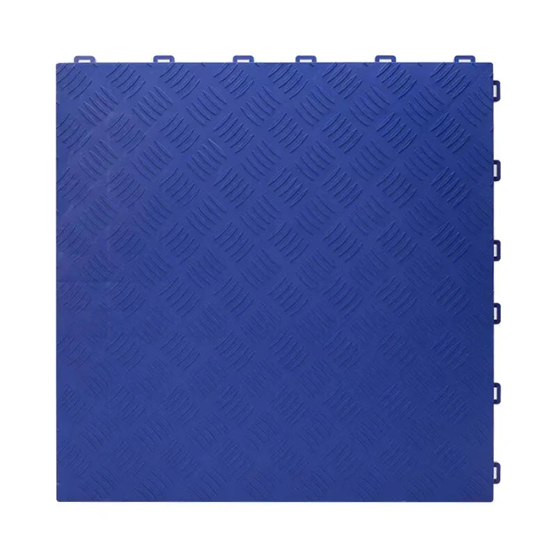 Blue interlocking floor grate with diamond tread pattern for garages, car washes, or playgrounds
