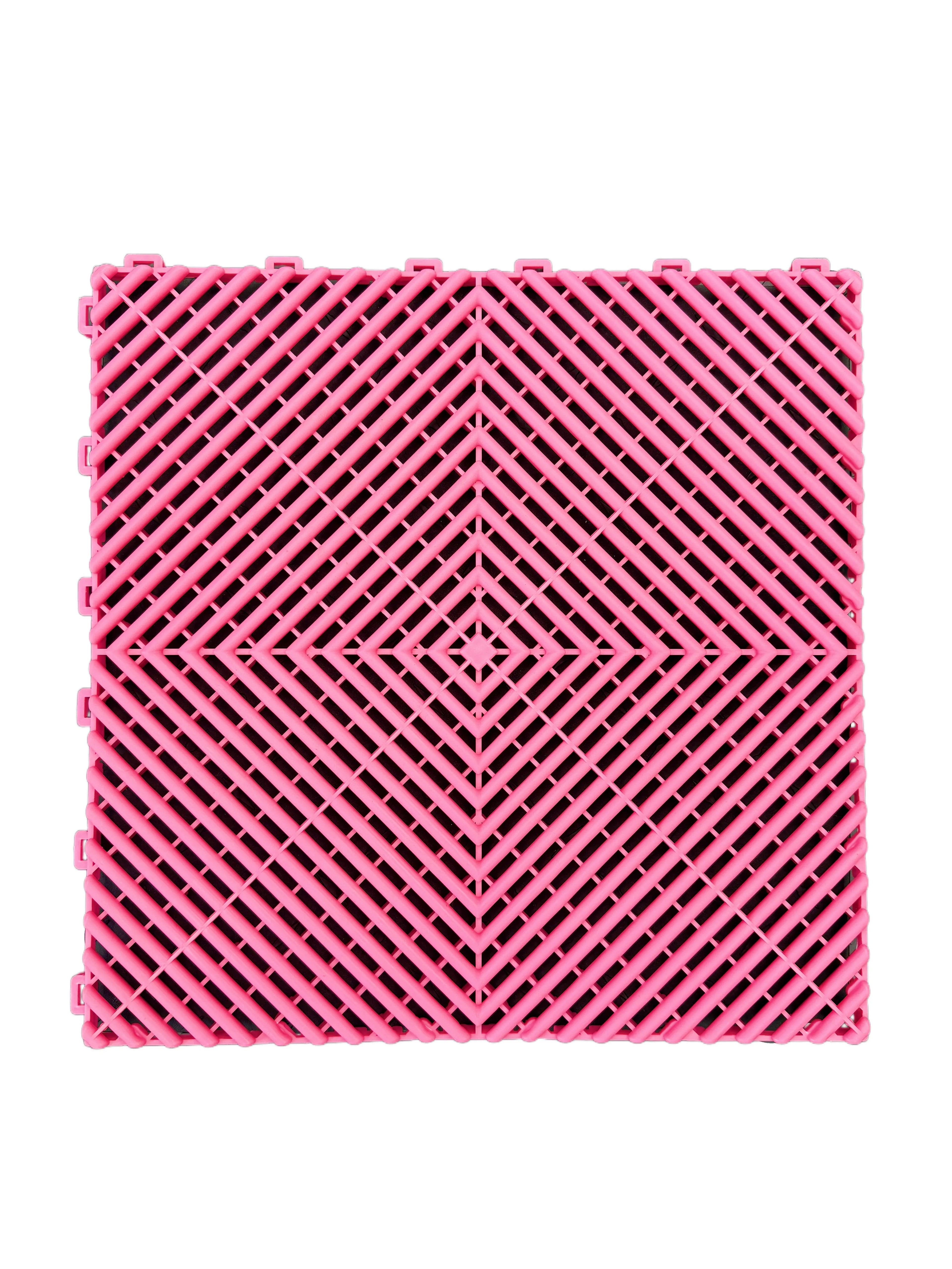 Pink interlocking floor grate tile for car washes, garages, pools, or playgrounds