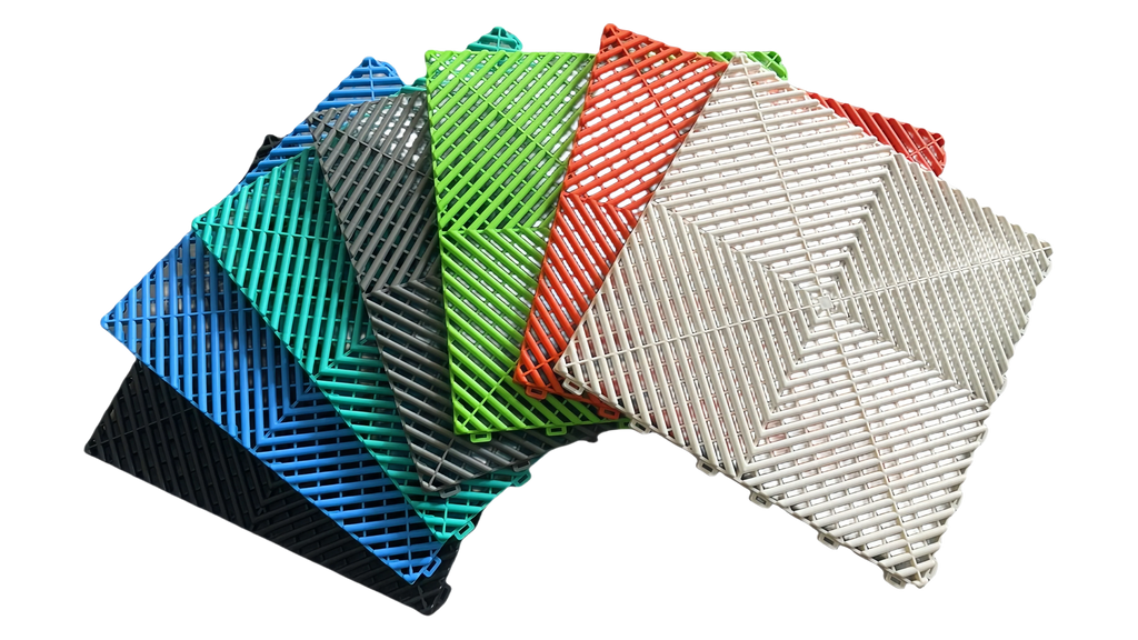 Colorful interlocking plastic floor grates for car washes, garages, pools, and playgrounds