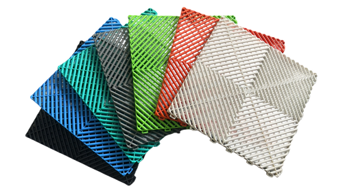 Colorful interlocking plastic floor grates for car washes, garages, pools, and playgrounds