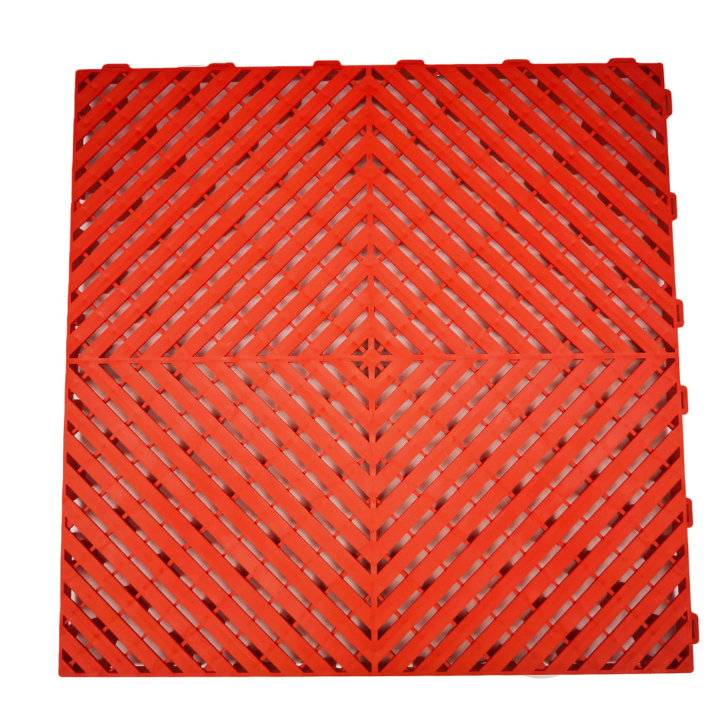 Red interlocking plastic floor grate for car washes, garages, pools, and playgrounds
